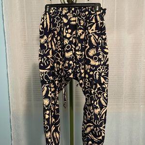 Anthropologie navy and blush silk-like floral joggers